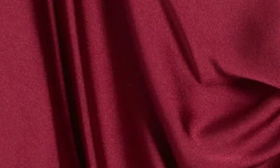 Renee C Plunge Neck Long Sleeve Twisted Knot Satin Top In Burgundy