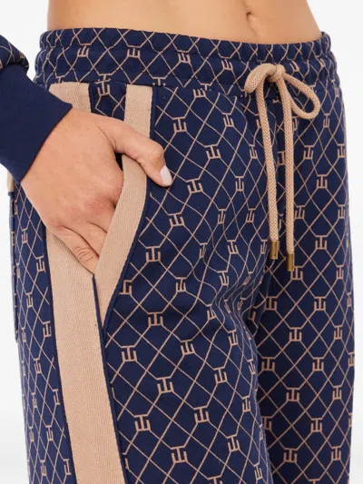 The Upside Ezra Nova Monogram Wide-leg Drawstring Sweatpants In Blue