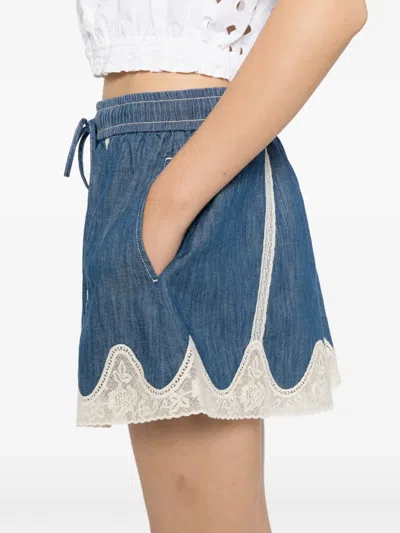 Zimmermann Awaken Lace-trimmed Denim Shorts In Blue