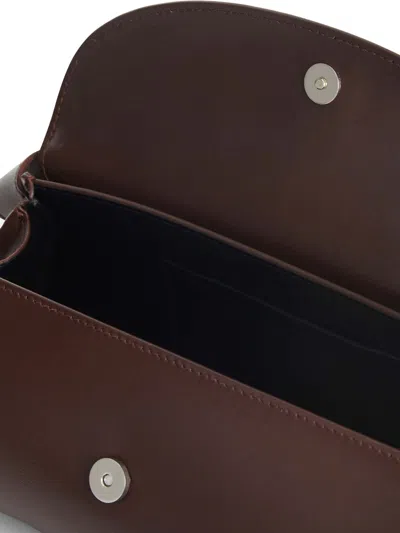 Jil Sander Women Cannolo Small Leather Shoulder Bag In Burgundy