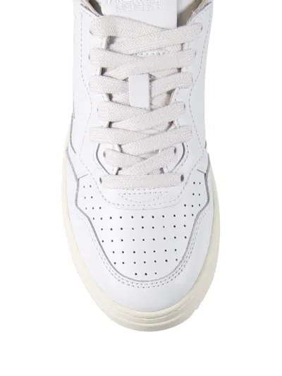 Autry Low-top Sneakers With Perforated Detailing And Metallic Accents In White