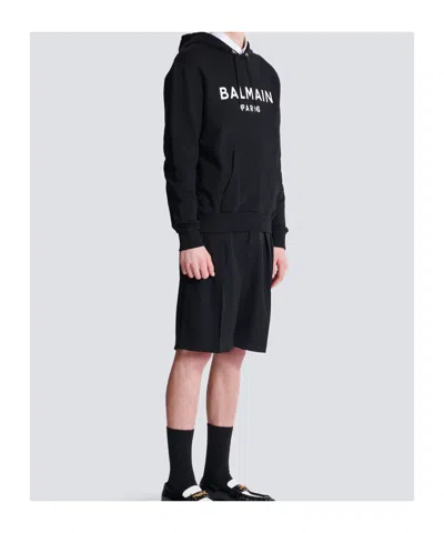 Balmain Logo Printed Drawstring Hoodie In Black