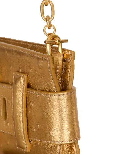 Balmain Anthem Laminated Leather Clutch In Gold