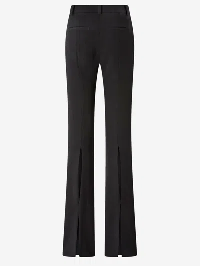 Pinko Tailored High-waisted Flared Trousers With Polished Button Detail In Black
