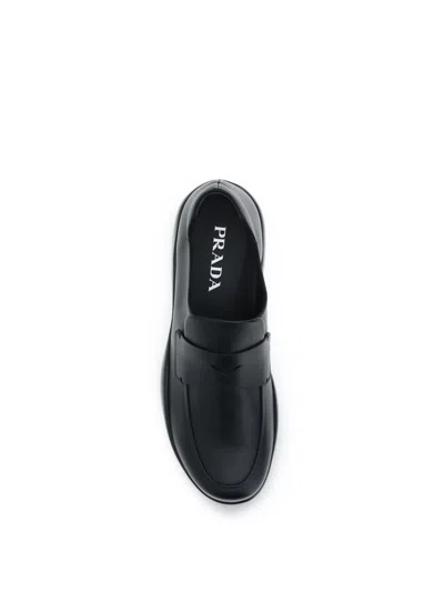 Prada Toblach Leather Loafers In Black
