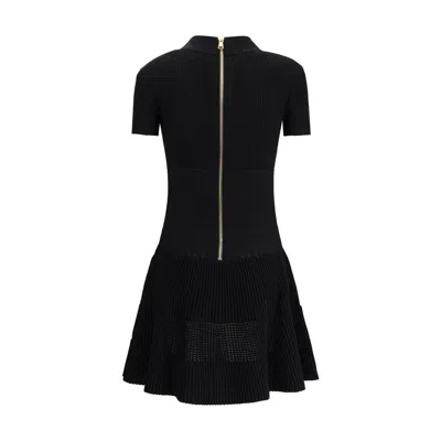Balmain Women Flared Knit Mini Dress In Black