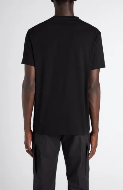 Alexander Mcqueen Mcqueen Paint Splattered Logo Graphic T-shirt In Black