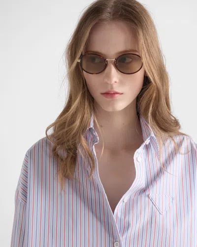 Prada Sunglasses With The Iconic Metal Plaque In Gold