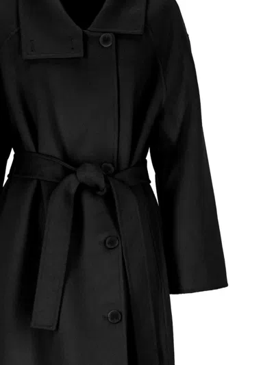 The Dynamis Studio Coats In Black