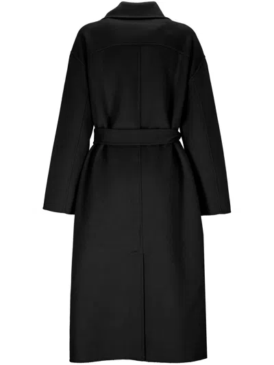The Dynamis Studio Coats In Black