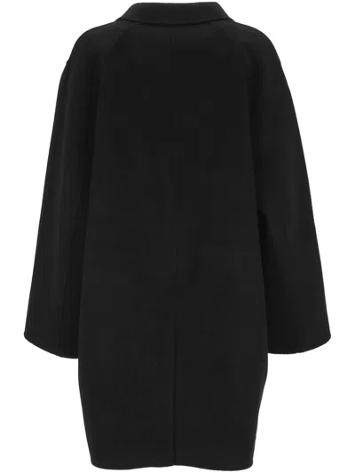 The Dynamis Studio Unlined Wool Coat With Flap Pockets In Black