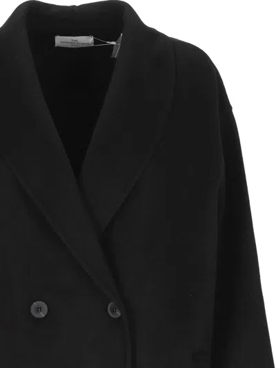 The Dynamis Studio Coats In Black