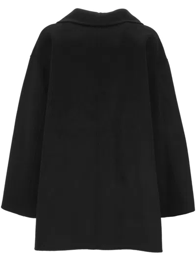 The Dynamis Studio Coats In Black