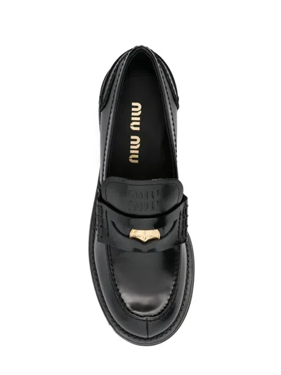 Miu Miu Penny Loafers In Brushed Leather In Black