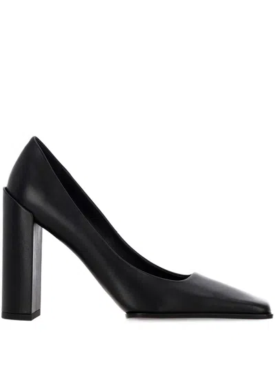 Alaïa Flat Shoes In Black