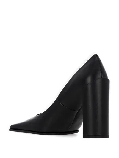 Alaïa Flat Shoes In Black