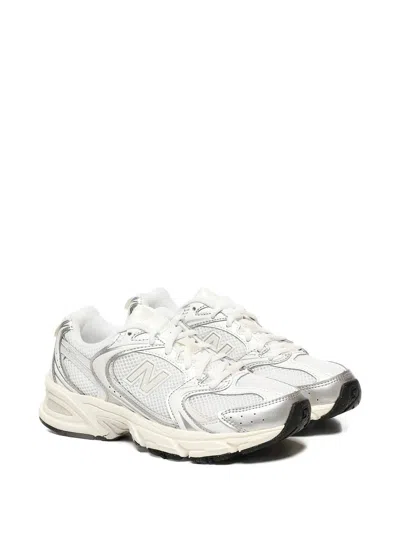 New Balance Mesh Rubber Sole Sneakers With Silver Accents In White