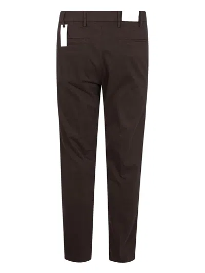 Michael Coal Logo-patch Trousers In Brown