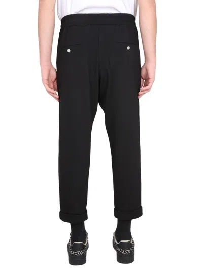 Balmain Timeless Embossed-button Drawstring-waist Trousers. In Black