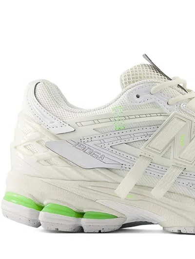 New Balance Low Top Sneakers With Mesh Panels And Reflective Accents In Multi