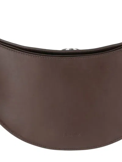 Jacquemus Compact Oval Embossed Logo Shoulder Bag In Brown