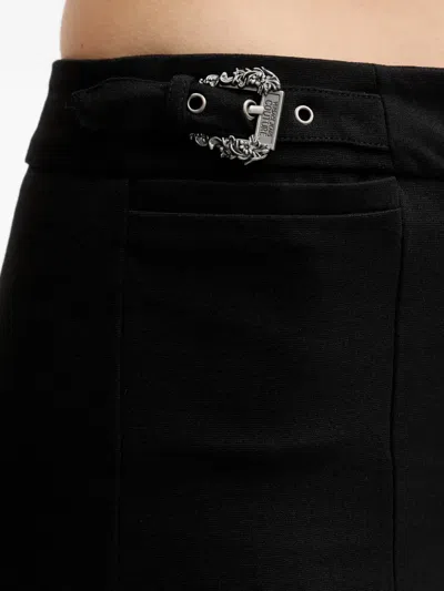 Versace Jeans Couture Buckle-detailed Trousers In Black