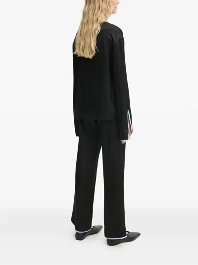 Sleeper Contrast-trim Pajamas In Black