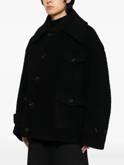 Songzio Curved Bell Coats In Black