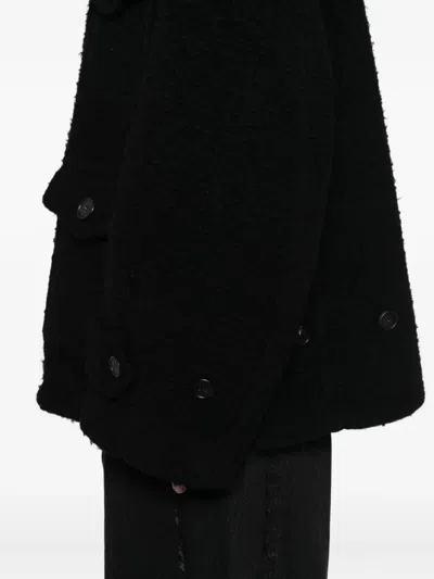 Songzio Curved Bell Coats In Black
