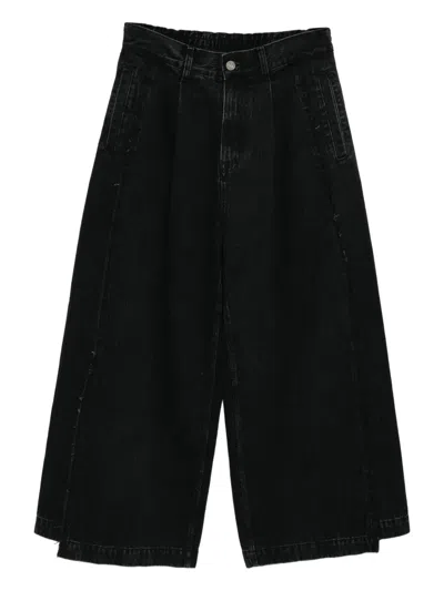 Songzio Asymmetric Cut Flare Jeans In Black