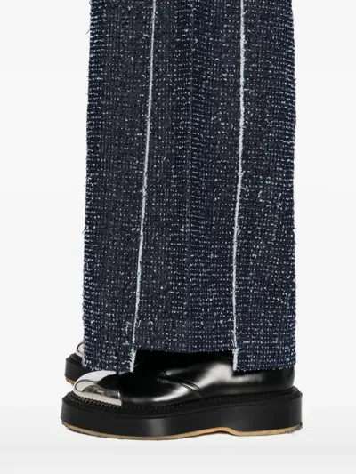 Songzio Asymmetric Flared Jeans In Blue