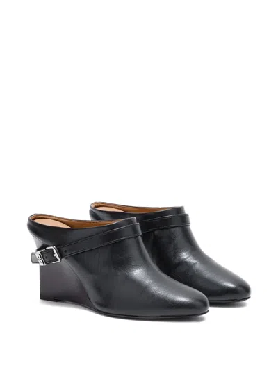 Ganni Buckle Wedge Mules In Black