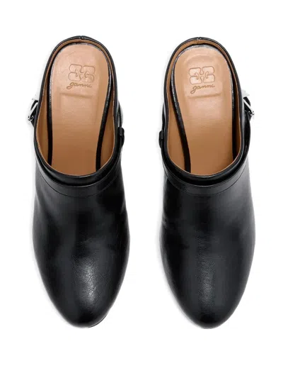Ganni Buckle Wedge Mules In Black