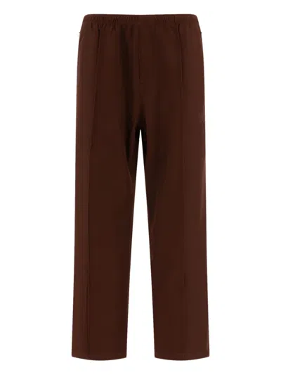 Needles Logo Embroidered Mid Rise Trousers In Brown
