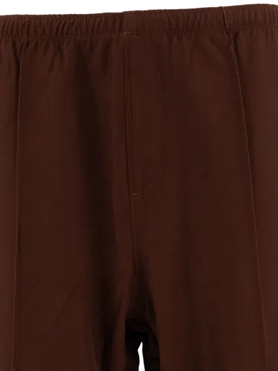 Needles Logo Embroidered Mid Rise Trousers In Brown