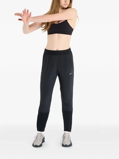 Nike Swift Zip-pocket Track Pants In Black
