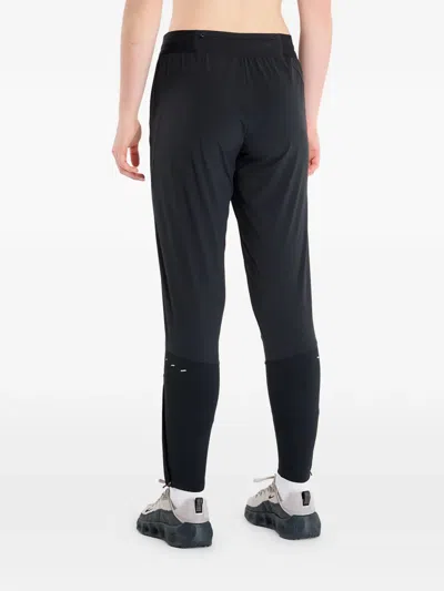 Nike Swift Zip-pocket Track Pants In Black