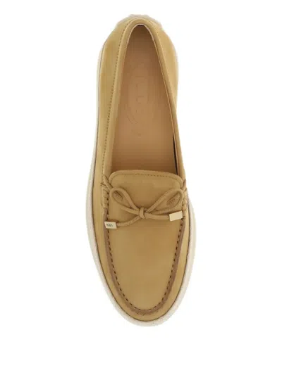 Tod's Bow-detail Round-toe Loafers In Neutral