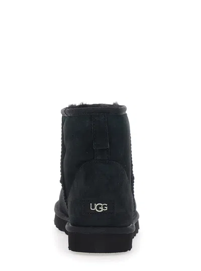 Ugg Classic Mini Black Ankle Boots With Logo Patch On The Rear And Shearling Lining In Suede Man In Black