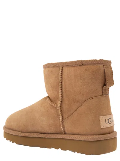 Ugg Classic Mini Beige Ankle Boots With Logo Patch On The Rear In Suede Woman In Brown