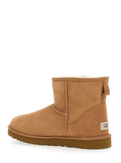 Ugg Classic Mini Brown Ankle Boots With Logo Patch On The Rear And Shearling Lining In Suede Man In Brown