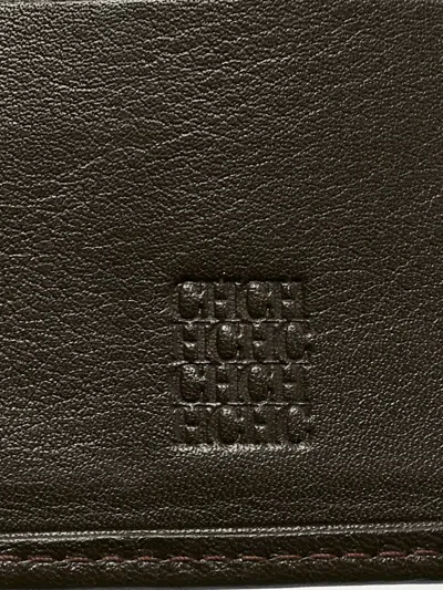 Pre-owned Carolina Herrera Vintage Monogram-embossed Leather Wallet In Brown
