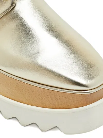 Pre-owned Stella Mccartney Elyse Star-cut Platform Sneakers In Gold