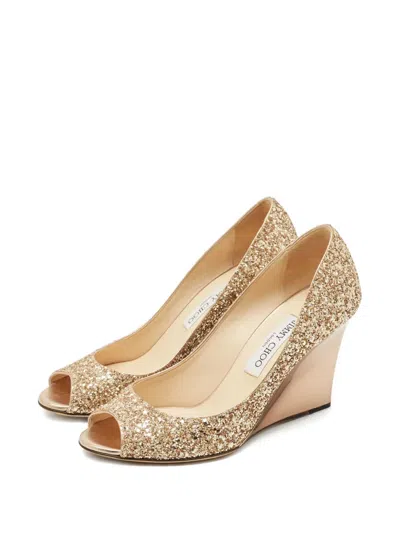 Pre-owned Jimmy Choo Baxen Wedge Pumps In Gold