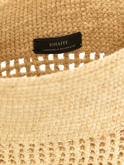 Khaite Small Billie Woven-raffia Bucket Bag In Brown