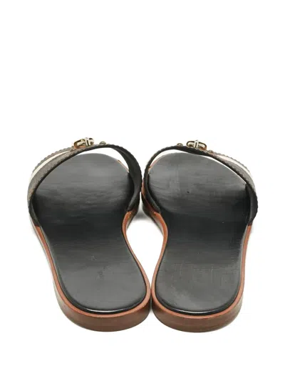 Pre-owned Louis Vuitton Lock It Monogram Canvas Slides In Brown