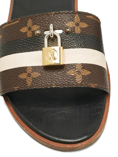 Pre-owned Louis Vuitton Lock It Monogram Canvas Slides In Brown