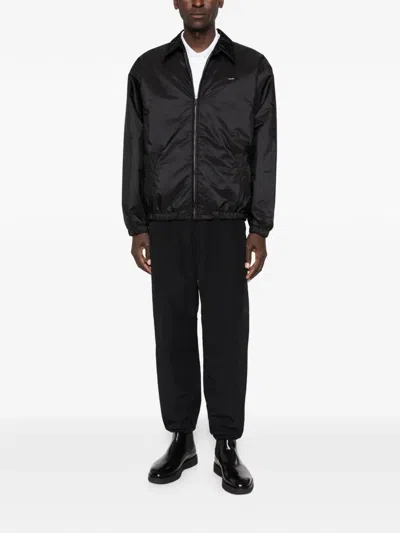 Prada Zipped Nylon Jacket With Logo Embroidery In Black