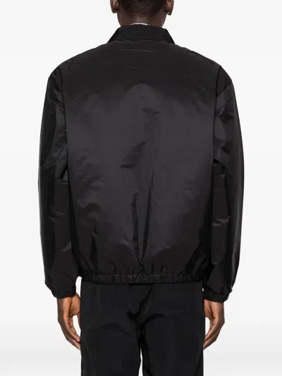 Prada Zipped Nylon Jacket With Logo Embroidery In Black