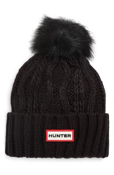 Hunter Logo Cable Knit Faux Fur Pompom Fleece Lined Beanie In Black